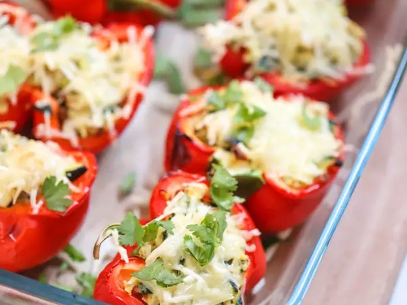 Stuffed peppers baked with cheese and coriander