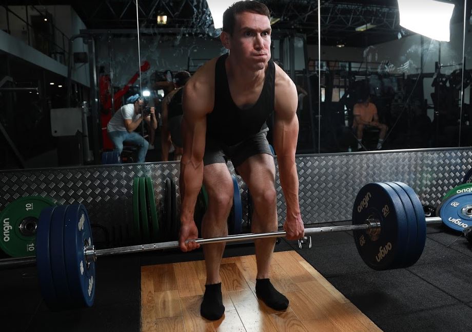 barbell deadlift in gym